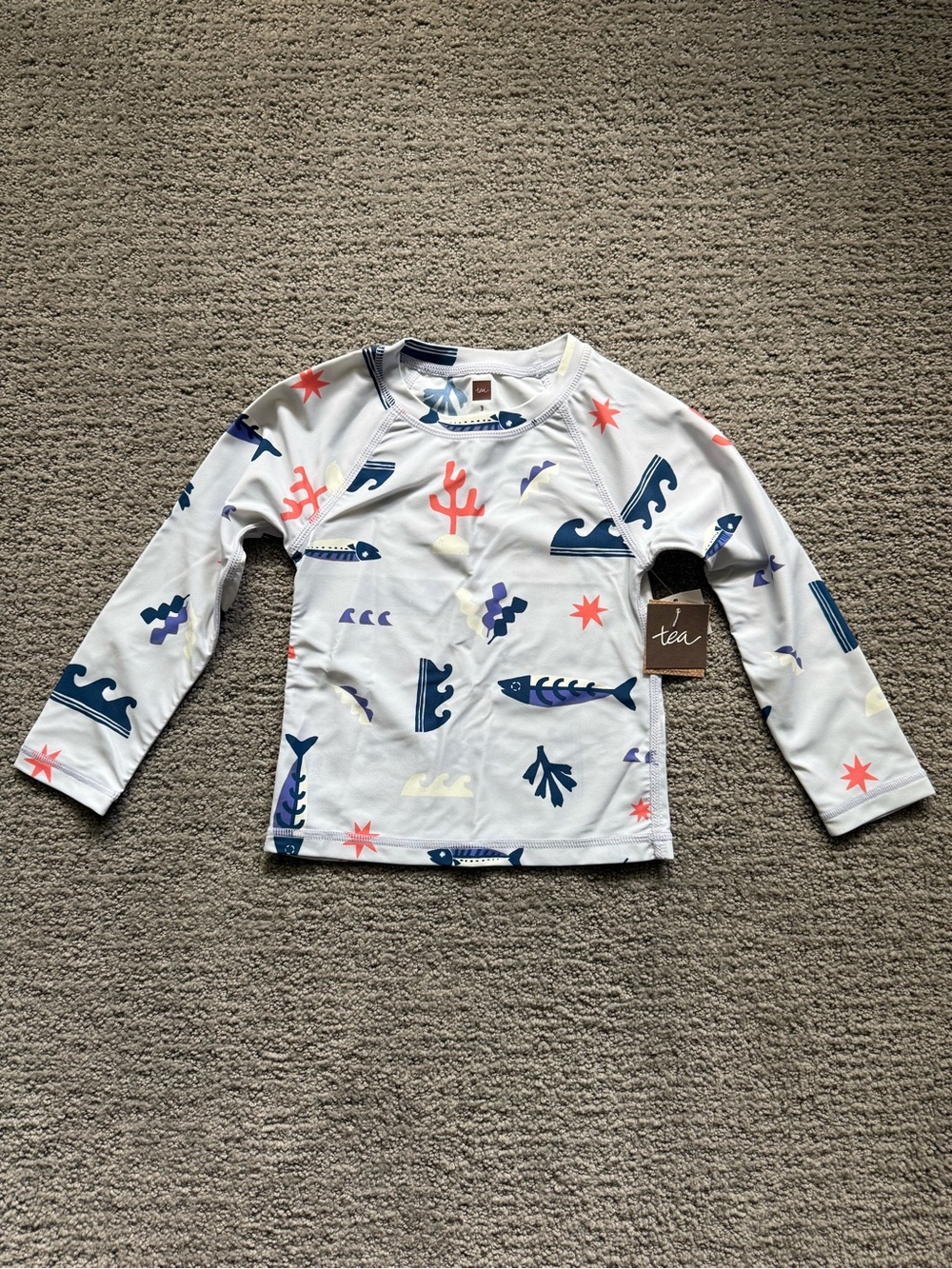 Tea Collection Rashguard with Navy Blue and Coral Sea Print